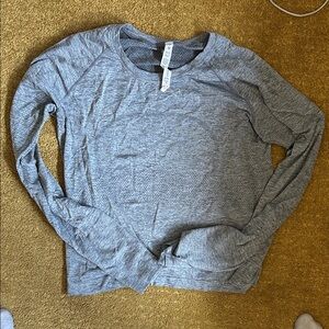 Lululemon gray long sleeve. Barely worn! Size 12
